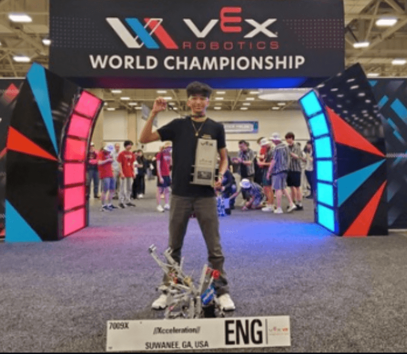 Syon Goel with a competition robot at VEX Worlds